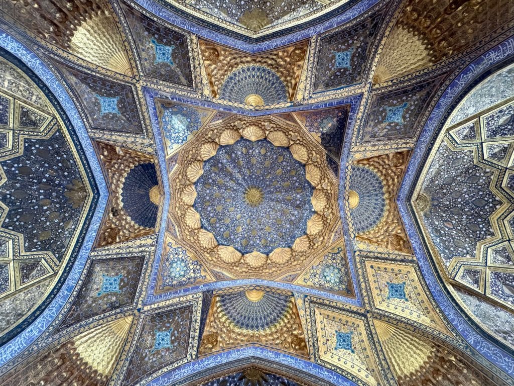 A further back image of the blue and gold ceiling, showing lots of different angles.