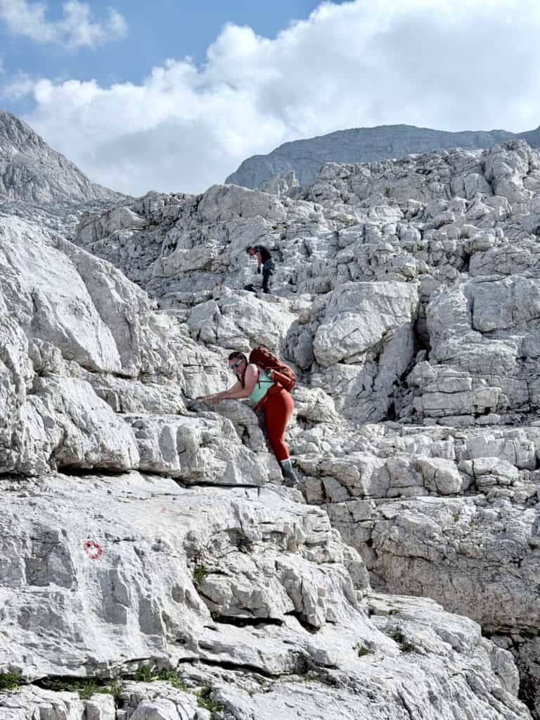 girl scaling rocks mt triglav