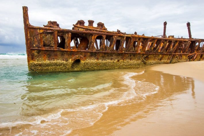 rusted Maheno Shipwreck  on the sand