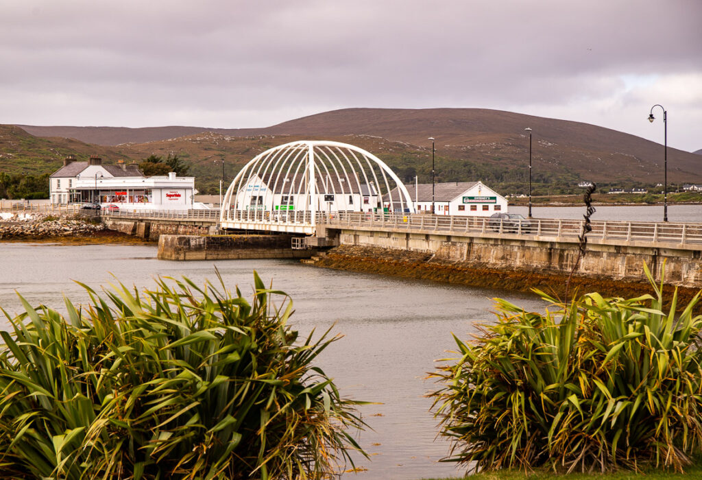 A white bridge spanning across water