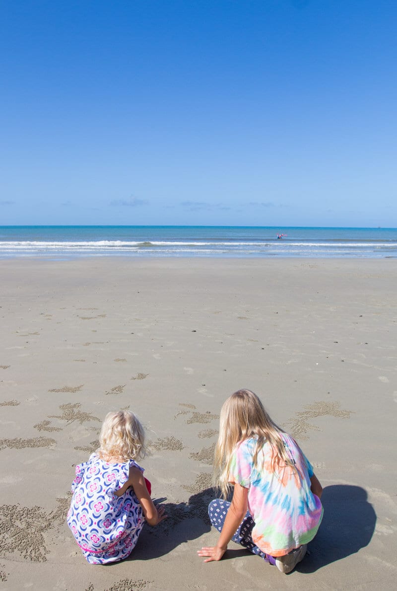 girls playing on Cape Tribulation Beach -