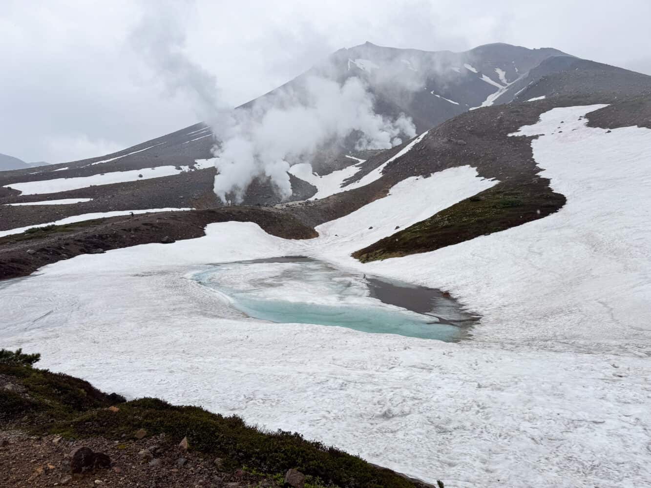 Snow in June at the top of Asahidake Ropeway, Hokkaido.