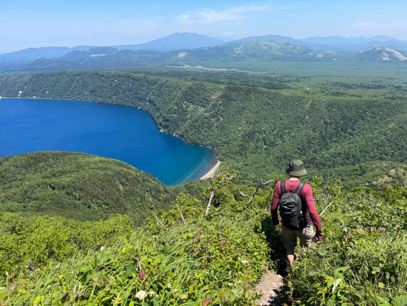 Hiking down from the Mt Mashu summit above Lake Mashu, Hokkaido.