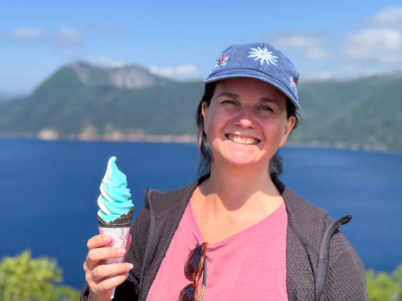 Erin with Mashu blue soft serve ice cream at Lake Mashu Observatory No 1.