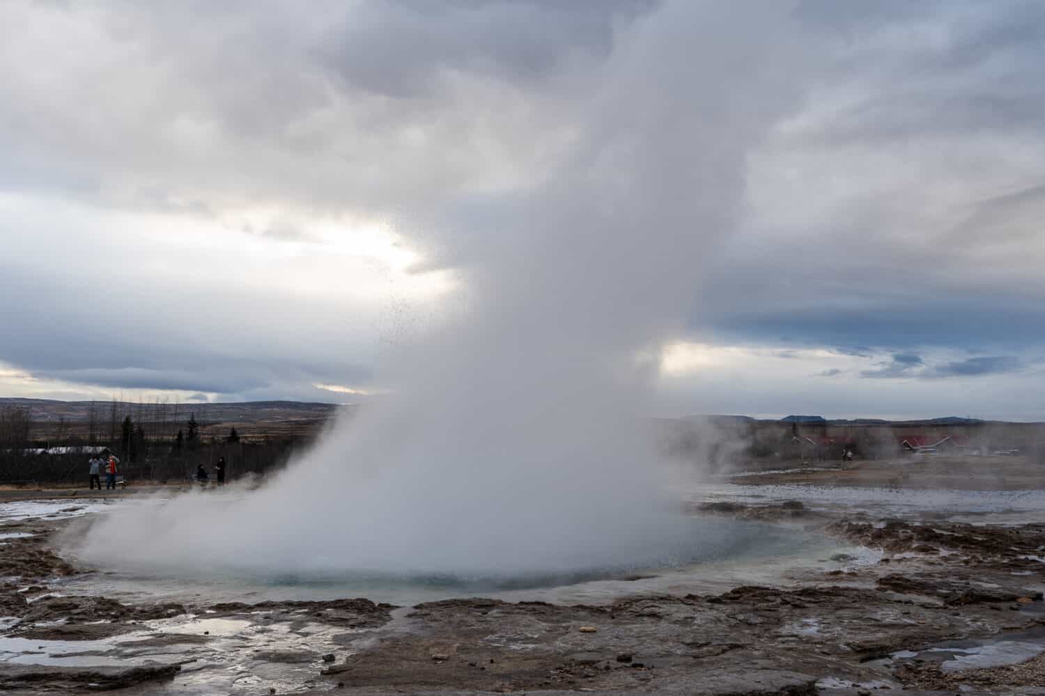 Strokkur Geysir erupting on the Golden Circle in Iceland in winter.
