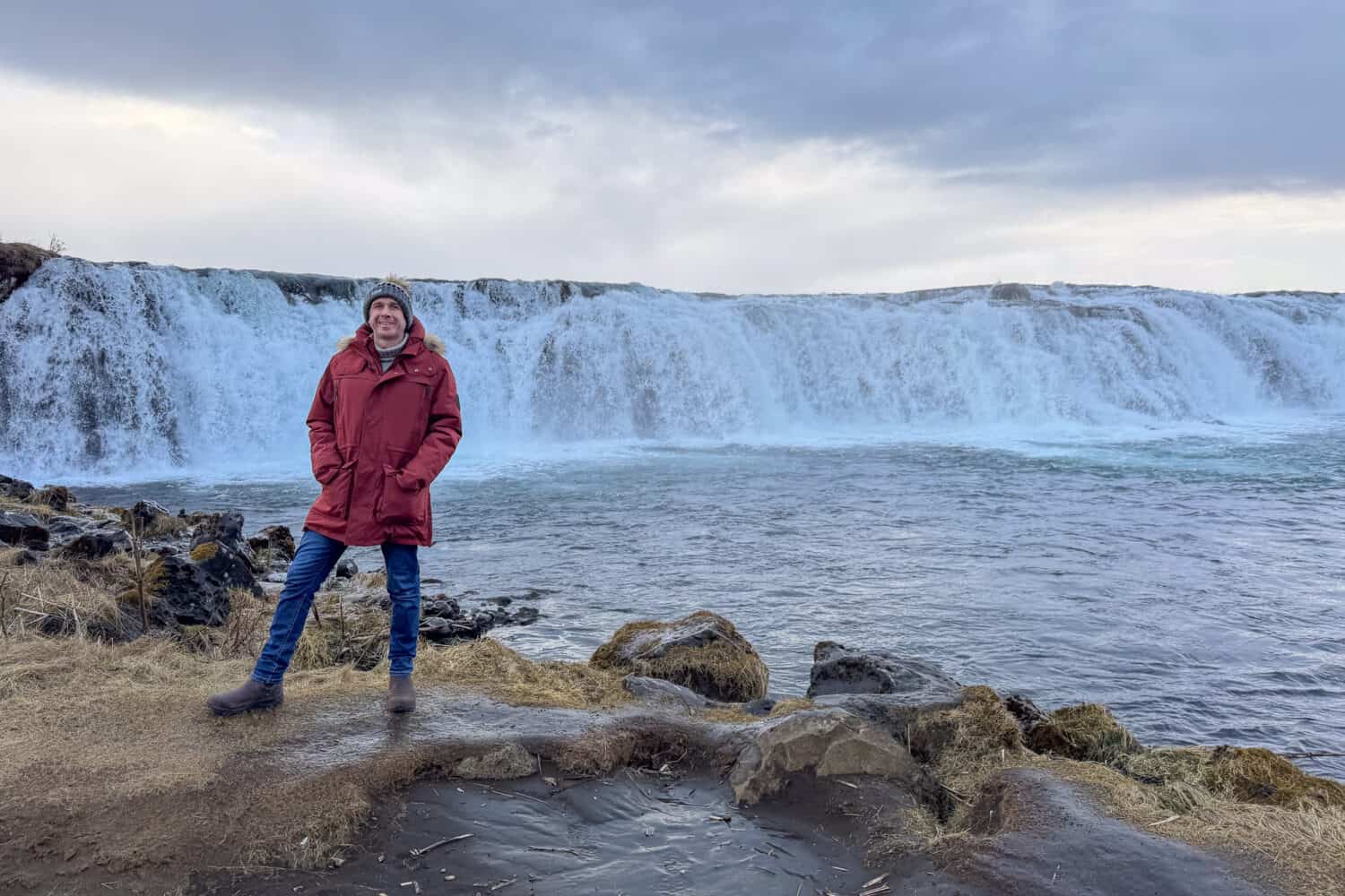 Simon at Faxafoss waterfall on the Golden Circle in Iceland in winter.