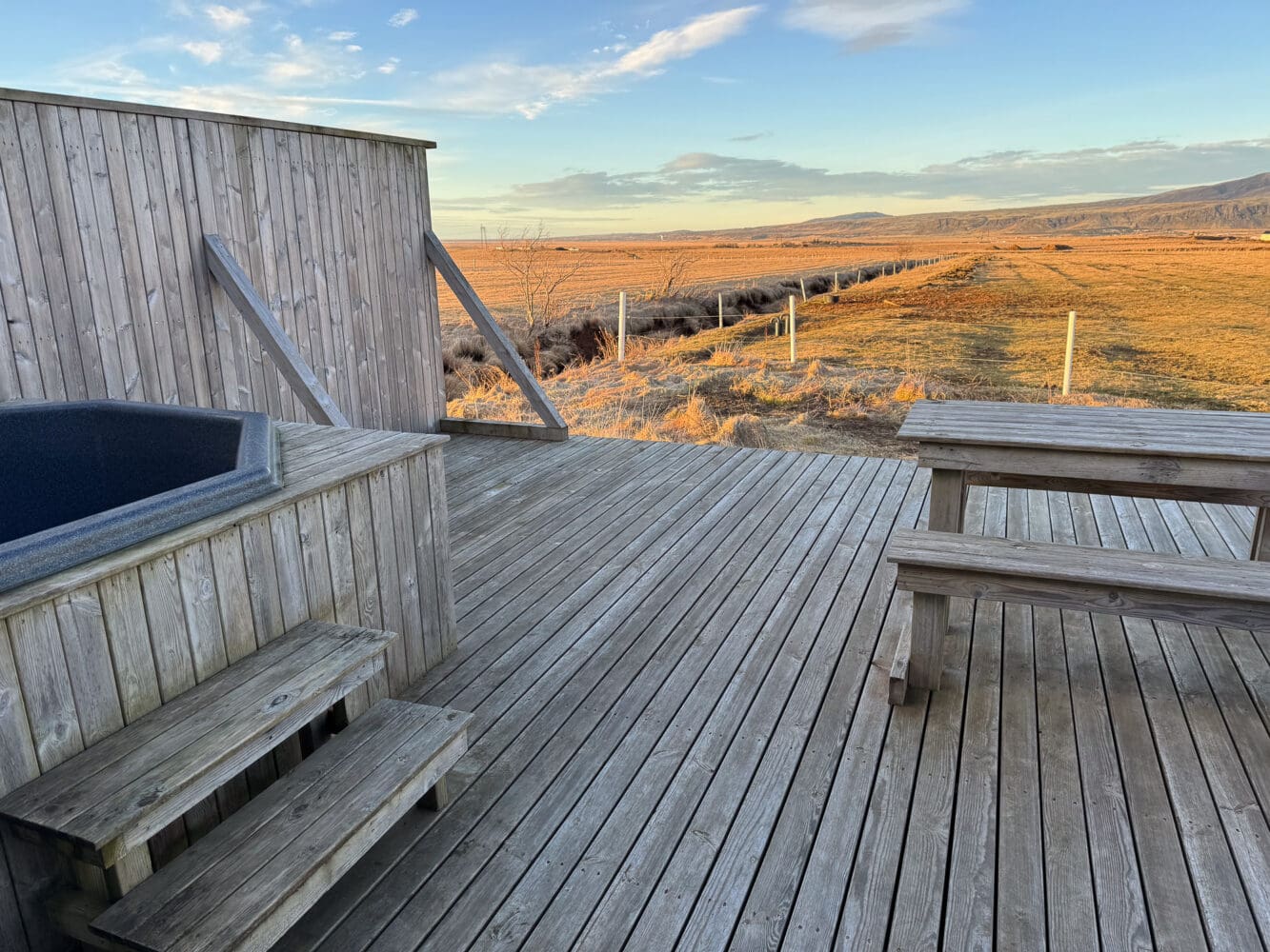 The hot tub on the terrace of Akurgerði Guesthouse 8 in Iceland.
