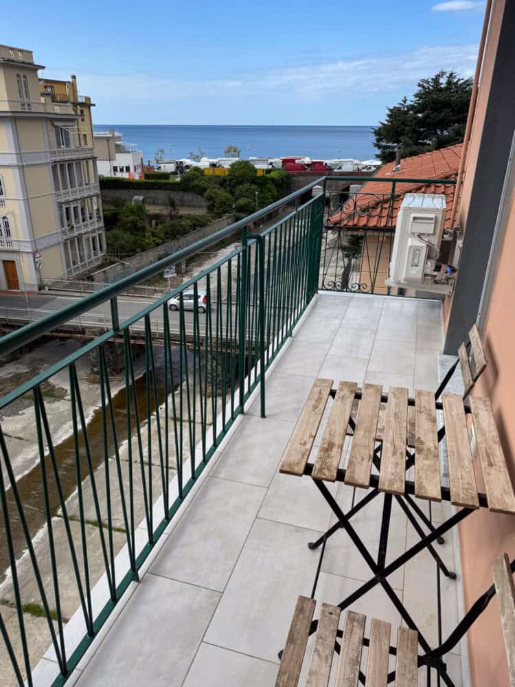 Balcony with sea view of The Sea Airbnb apartment in Levanto, Italy.