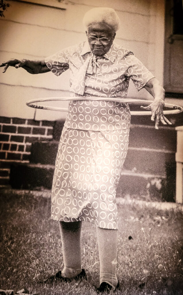 black elderly lady hool hooping