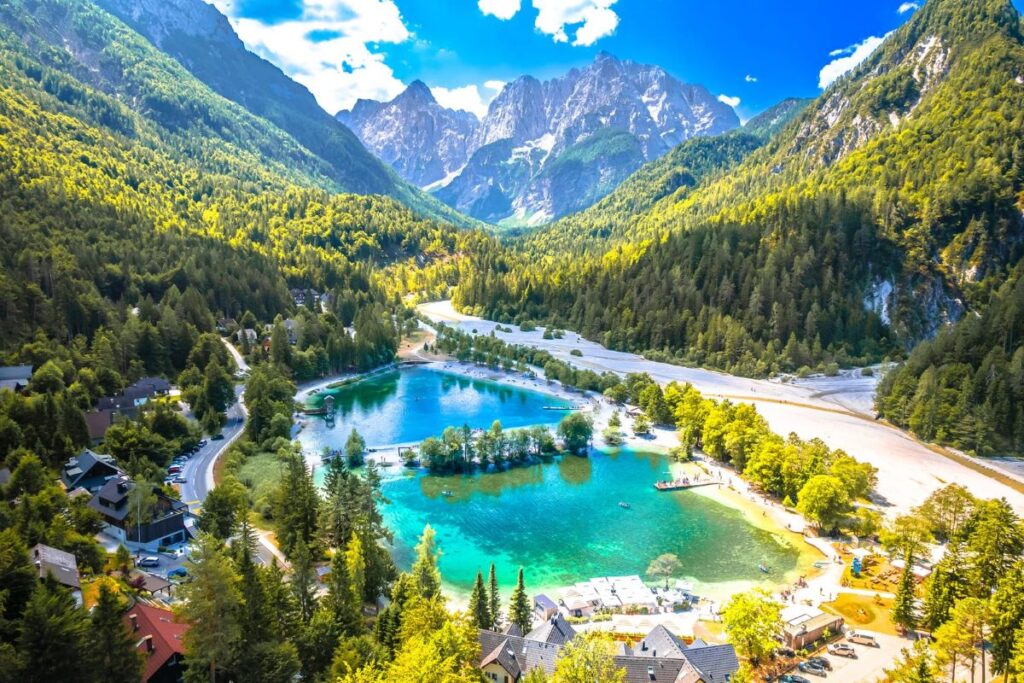 Scenic Jasna lake in Kranjska Gora aerial view, Julian Alps in Sloven