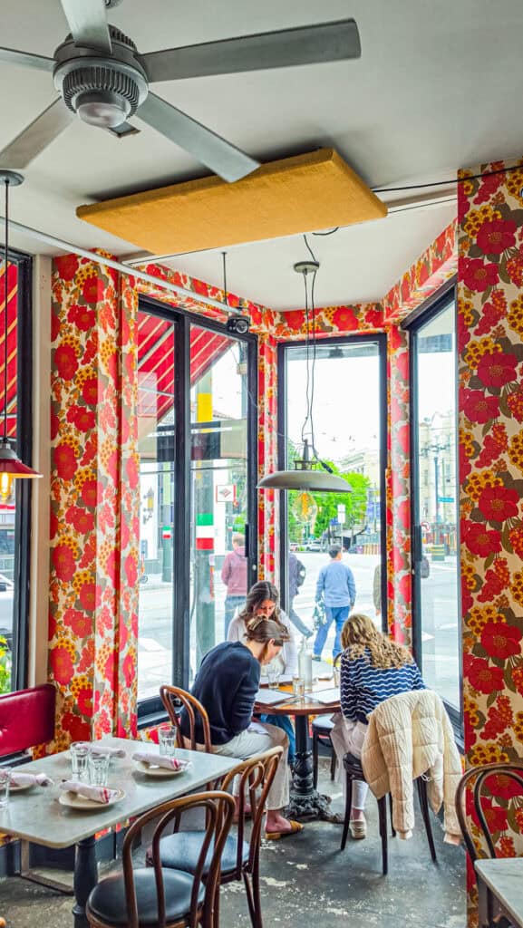 diners at corner window table Barabara north beach