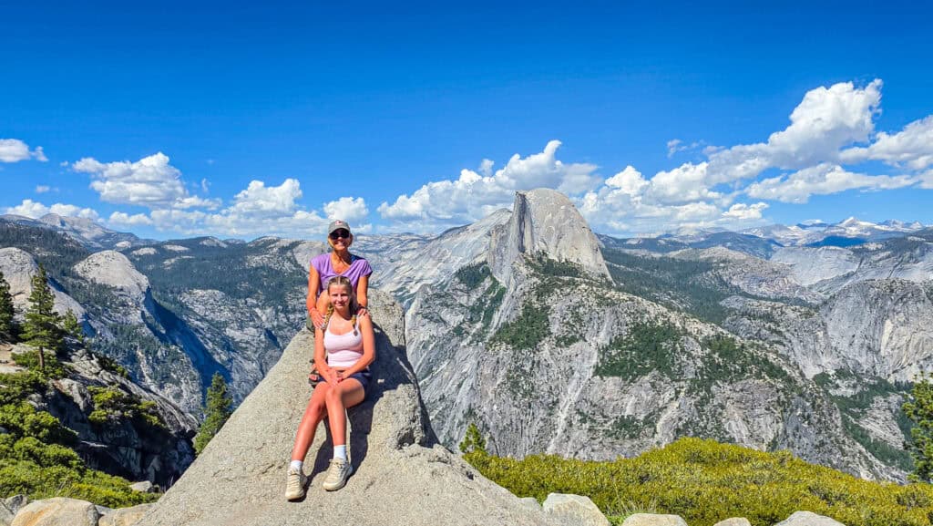 mother and daughter posing at glacial overlook