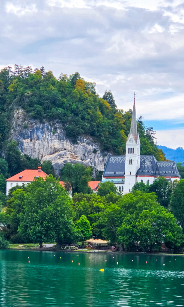church and old parish house on lake bled