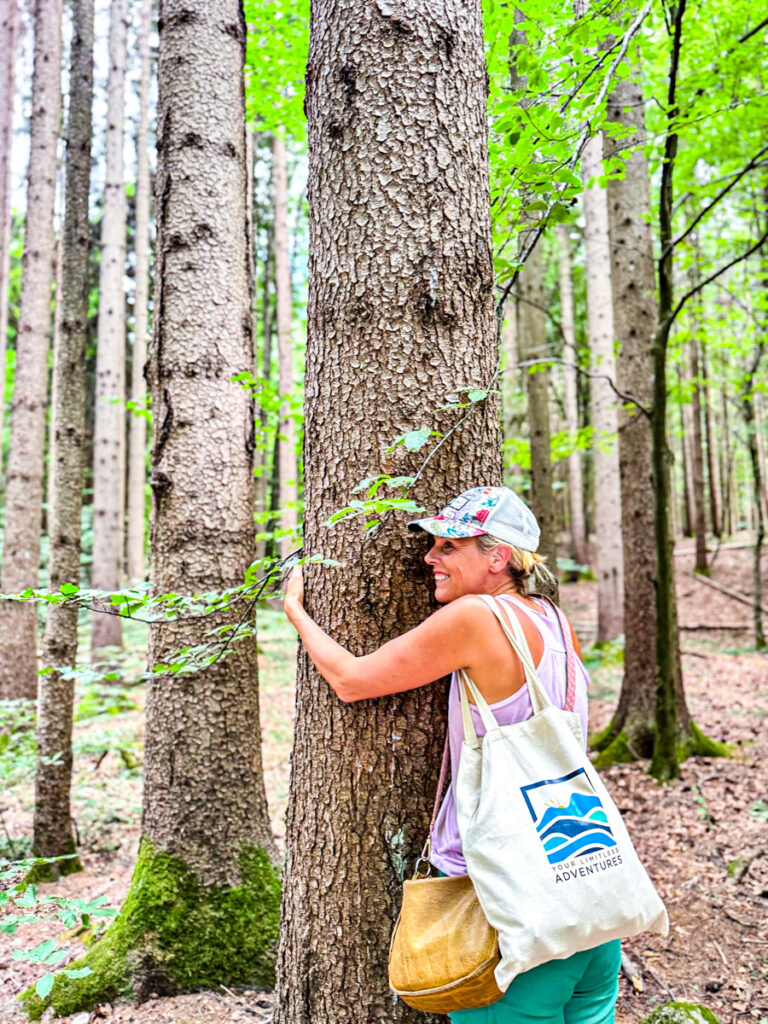 woman hugging tree