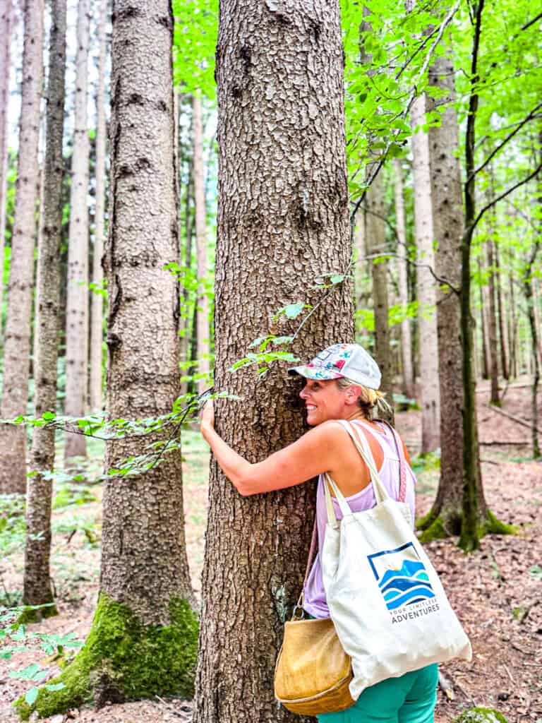 woman hugging tree