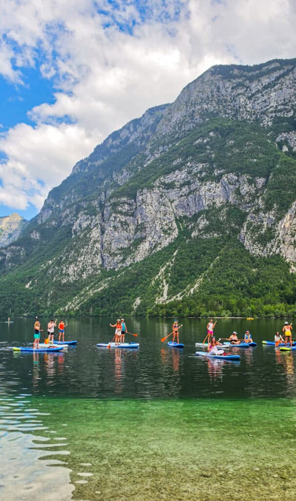 paddleboarders lake bohinj