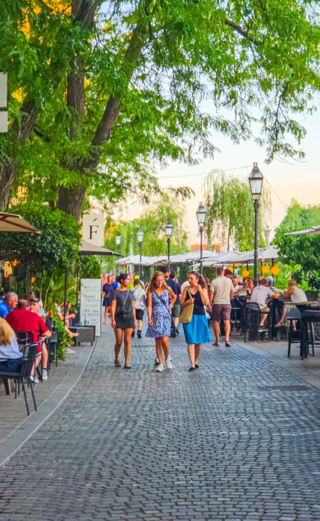 people walking along the ljubljana river