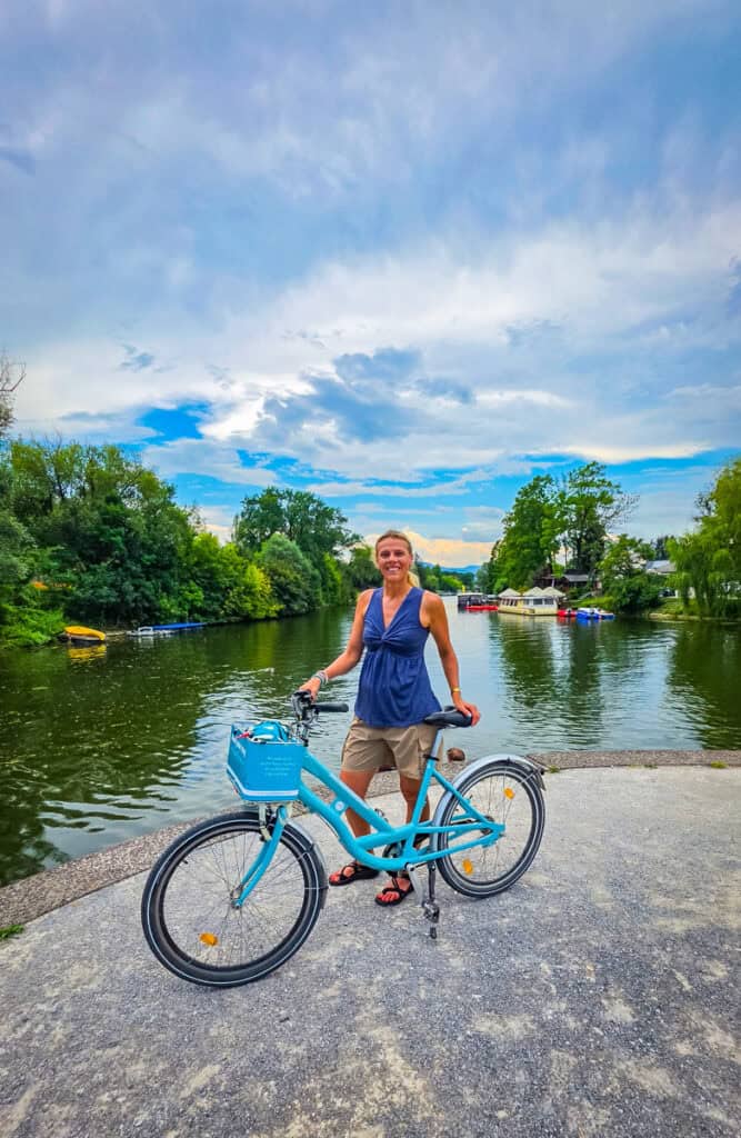woman on bike near Ljublijana river
