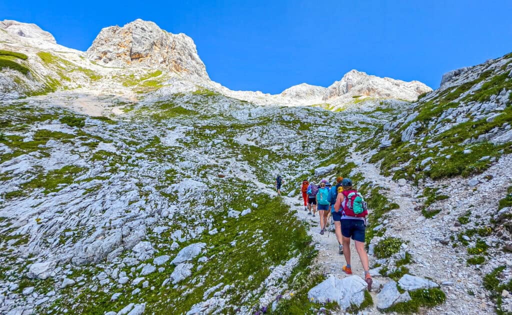 hikers on trail to mt triglav