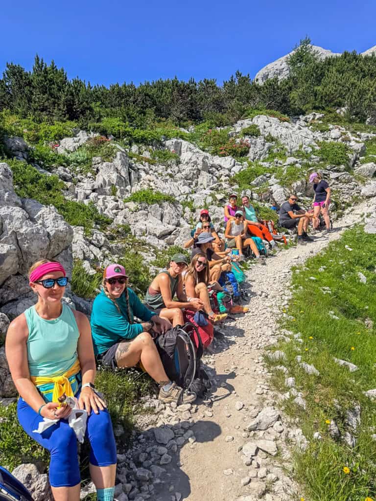 woman having snacks n triglav trail