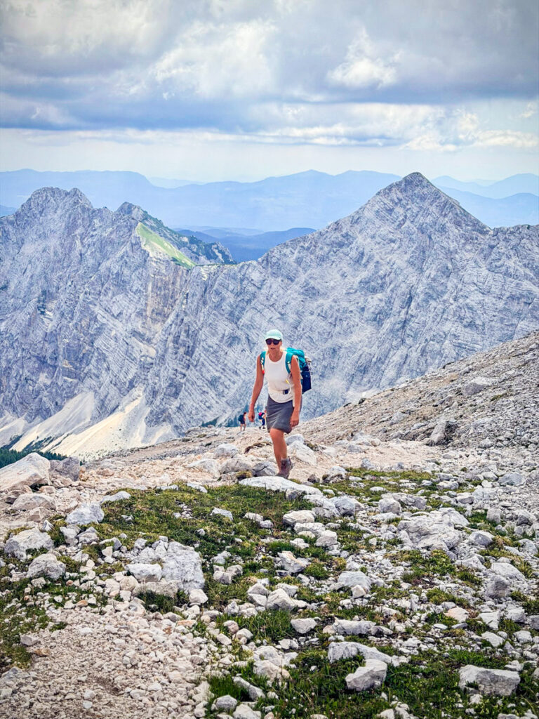 woman standing in font of moutains at mount triglav
