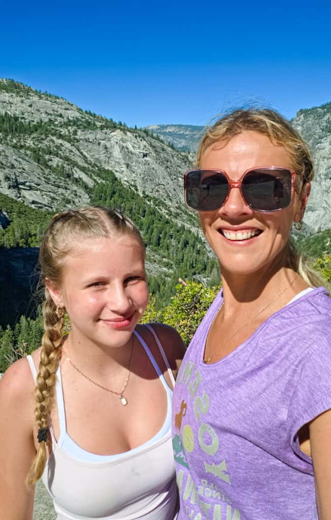 mother daughter selfie at top of nevada fall with view