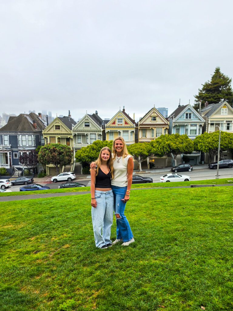 mother and daughter in front of the painted ladies 