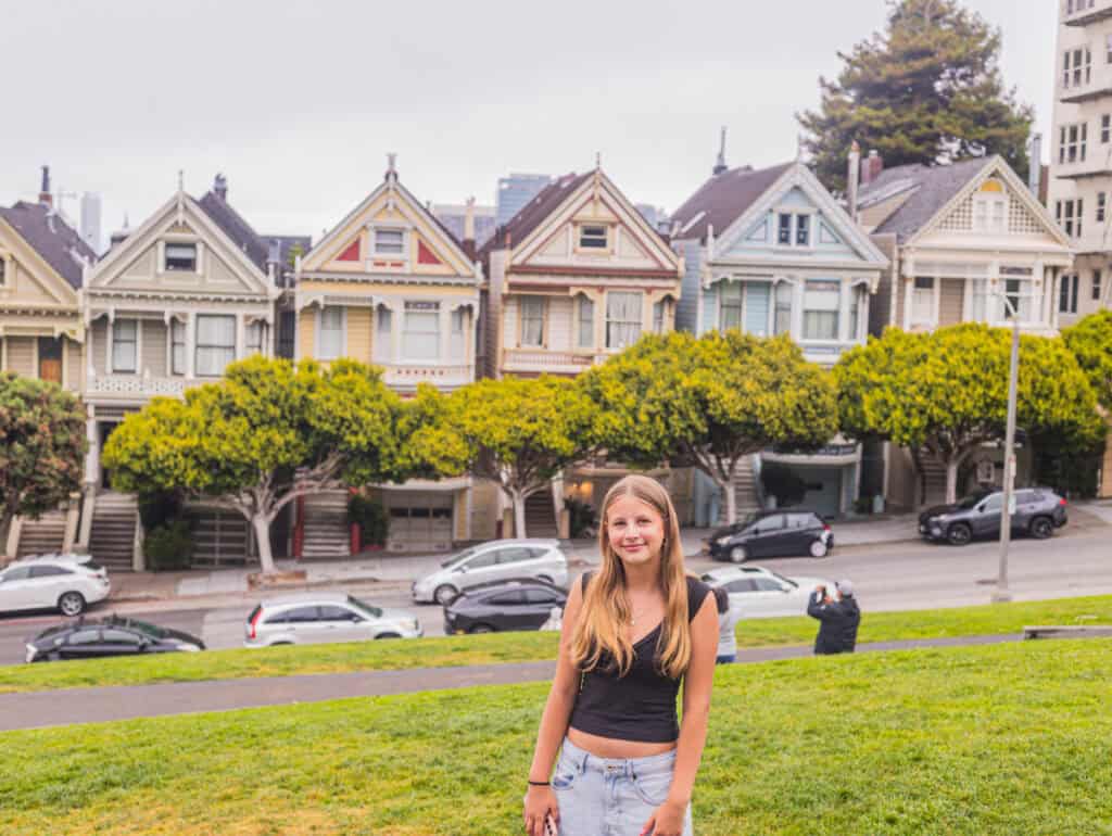 girl in front of painted ladies