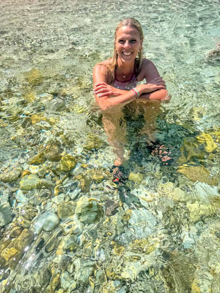 woman sitting in soca river
