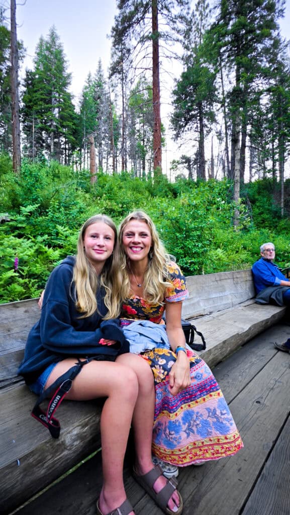 mother and daughter on log caboose sugar pine railroad