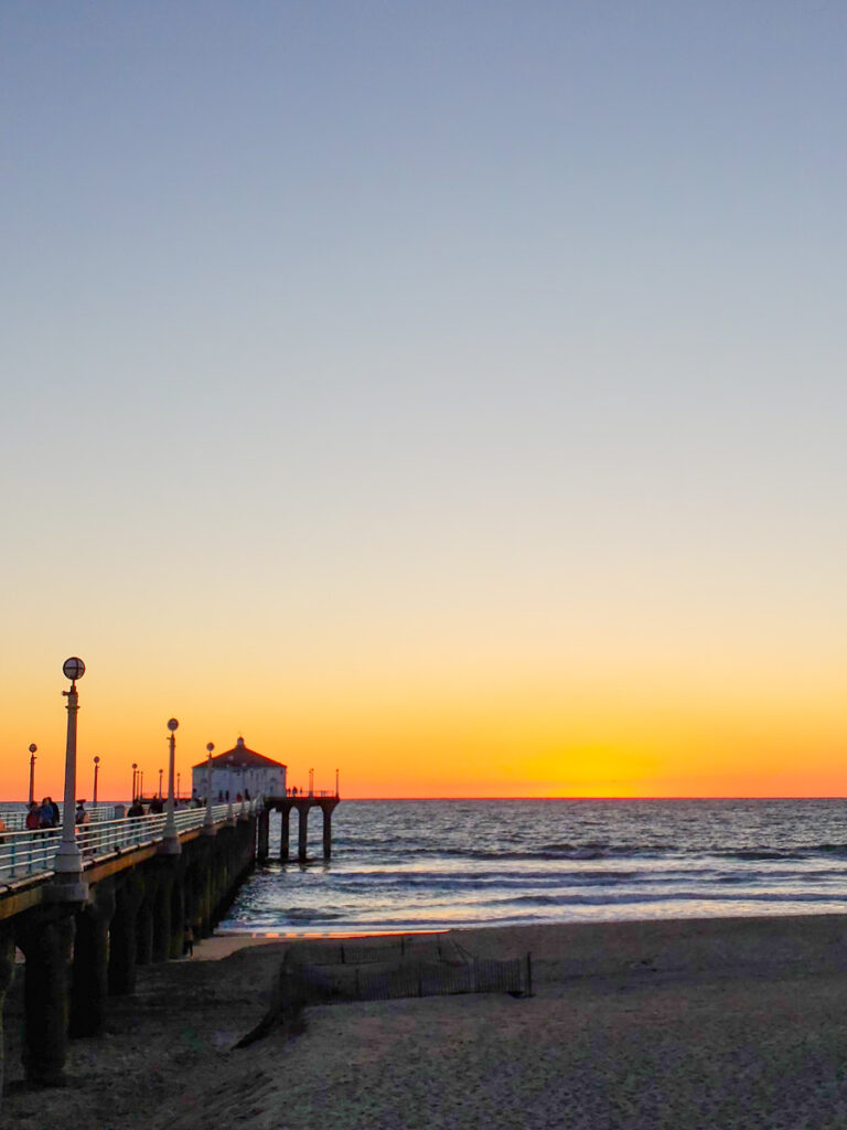 sunset over pier manhattan beach la
