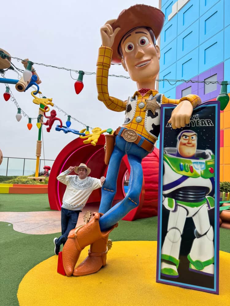 Simon with Woody at Toy Friends Square at the Toy Story Hotel at Tokyo Disney. 
